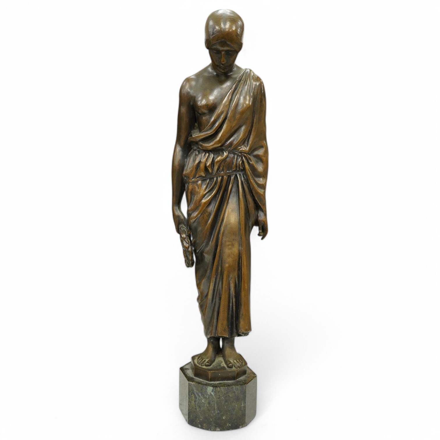 An early 20th century bronze figure of a classical maiden holding a laurel wreath, 46cm high. Condition - good